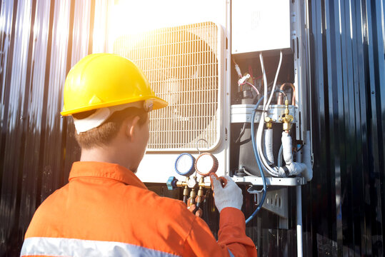 HVAC technician servicing outdoor unit